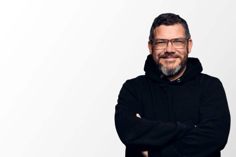 Martin de la Vega. Ein Mann mitte 40 der Sympatisch in die Kamera guckt